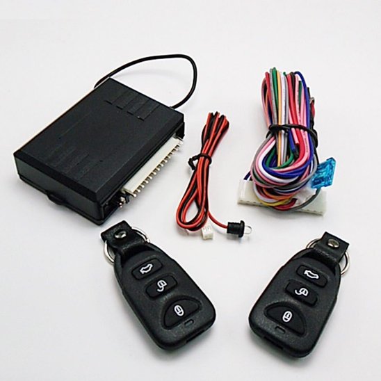 composants d'une alarme voiture avec deux télécommandes